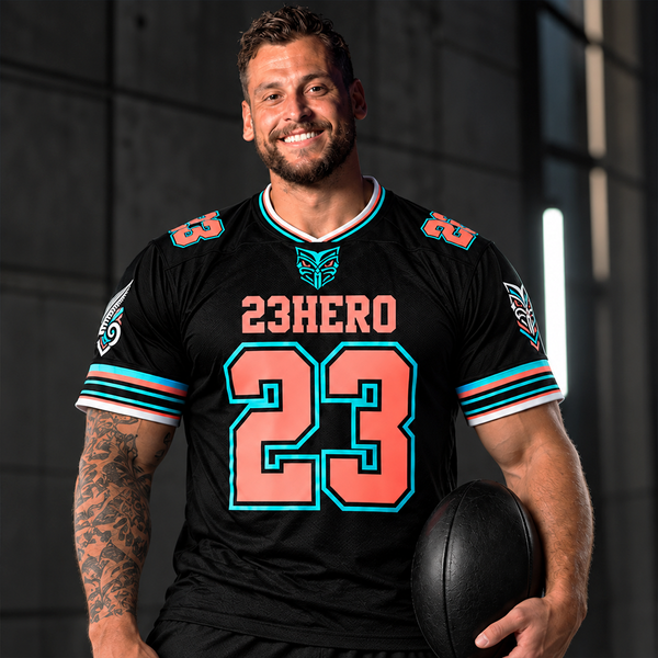23HERO Black NZ Fern Rugby Jersey with coral and aqua number 23 worn by male model.
