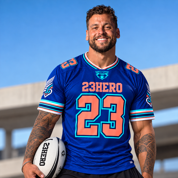 23HERO Blue NZ Rugby Jersey with coral and aqua number 23 worn by male model.